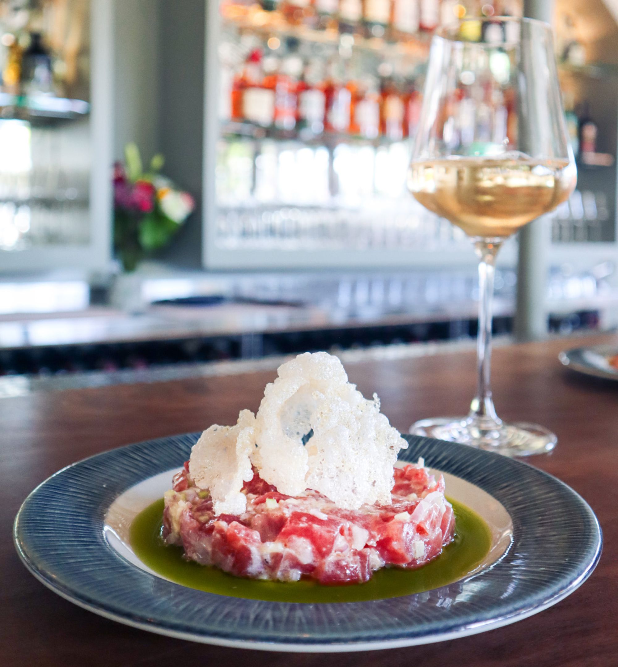Photo of seafood dish paired with wine at Fisch & Flore.