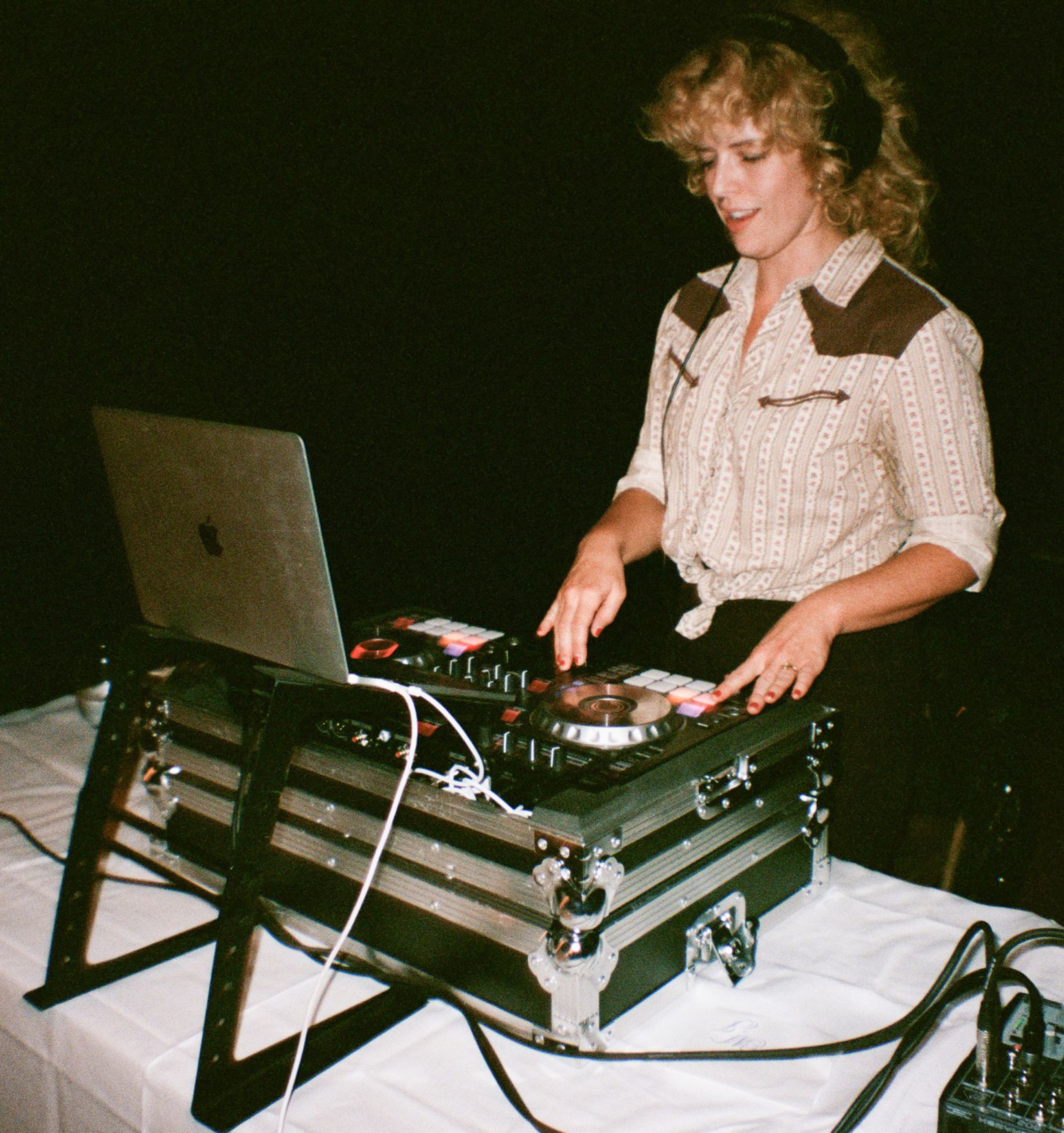 Photo of DJ playing music