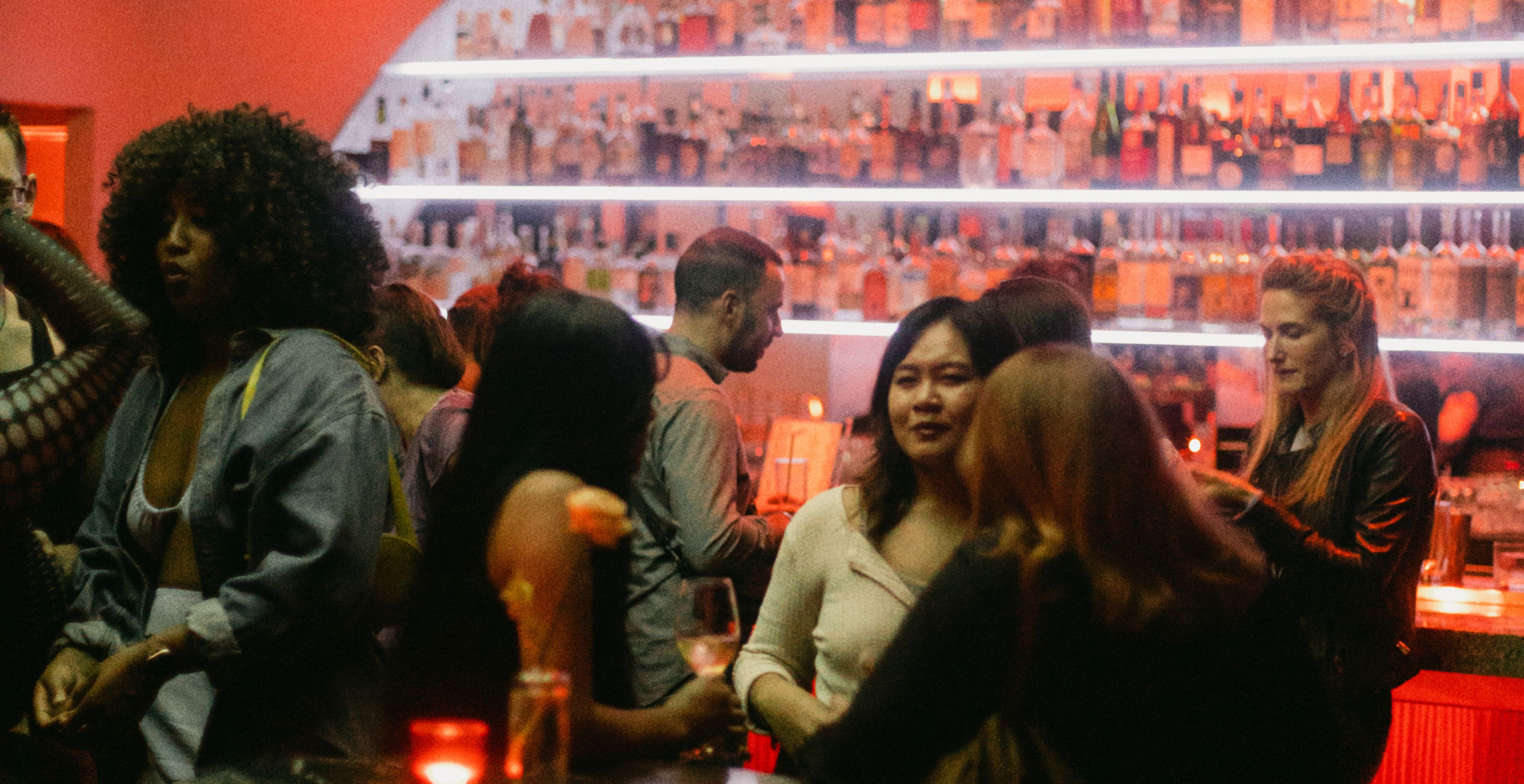 Photo of attendees hanging out at Nido Club's social party event