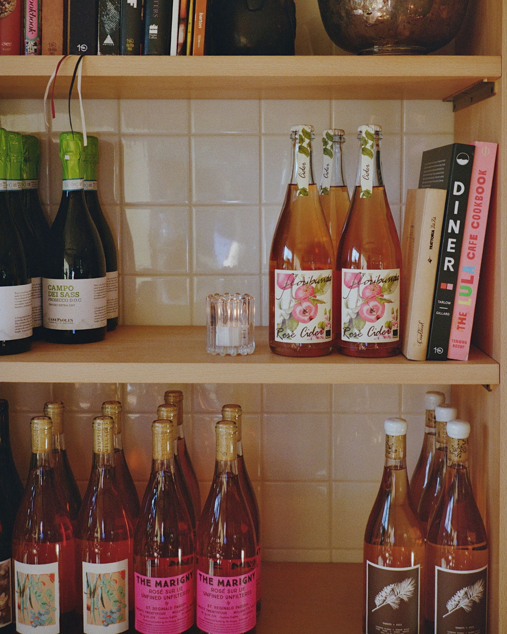Photo of store shelf at No Saint featuring bottles for sale