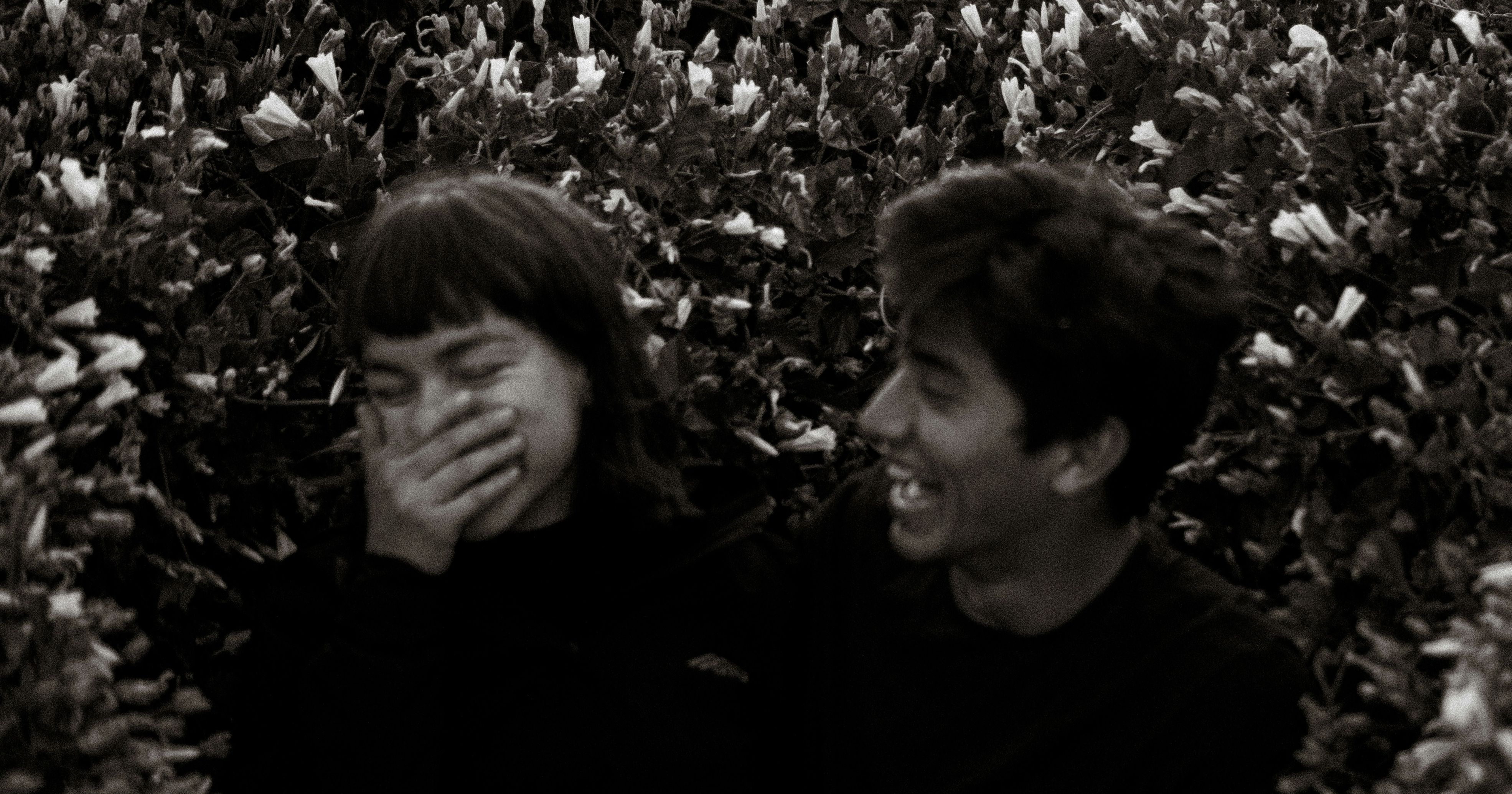 Couple laughing at a Play-Date Collective event