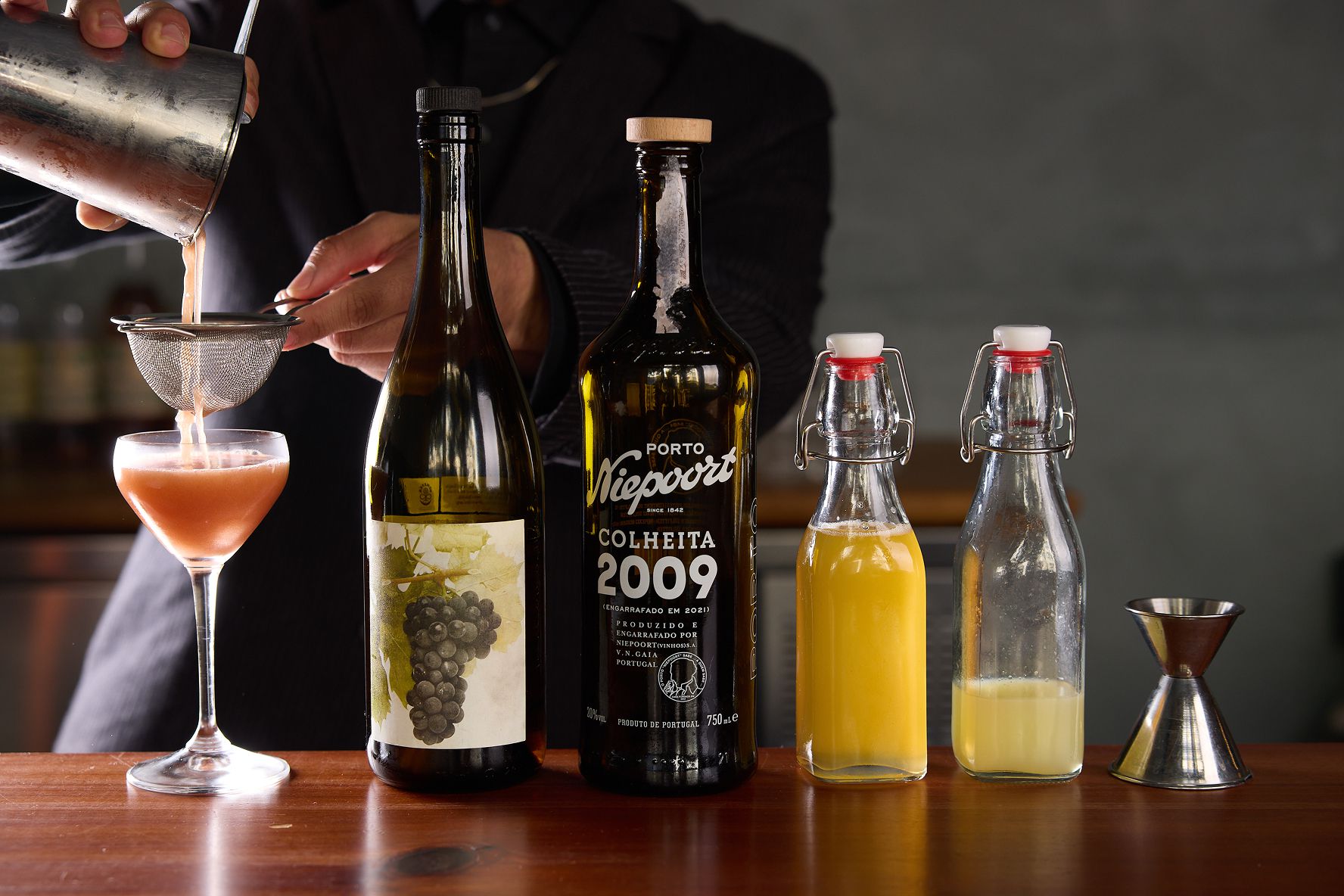 Photo of bar at Osito with cocktail being made