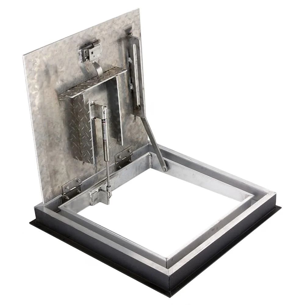 FLDD drainable floor door, open, showing the gutter channel inside the frame and the hold-open arm