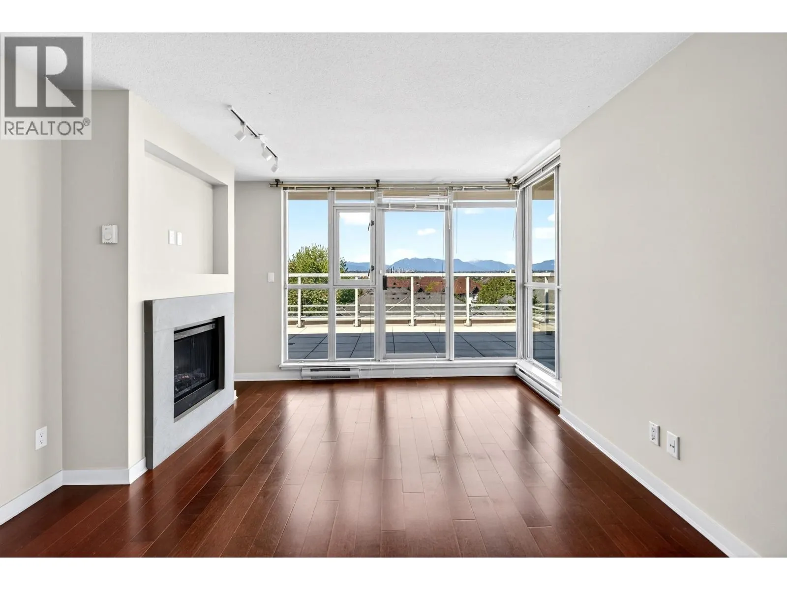 Empty living room used to compare AI virtual staging tools