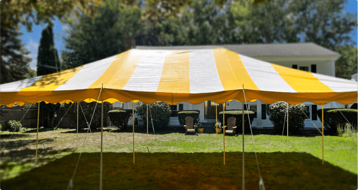 Spacious 20x30 tent set up for an outdoor event, providing elegant shelter and ambiance