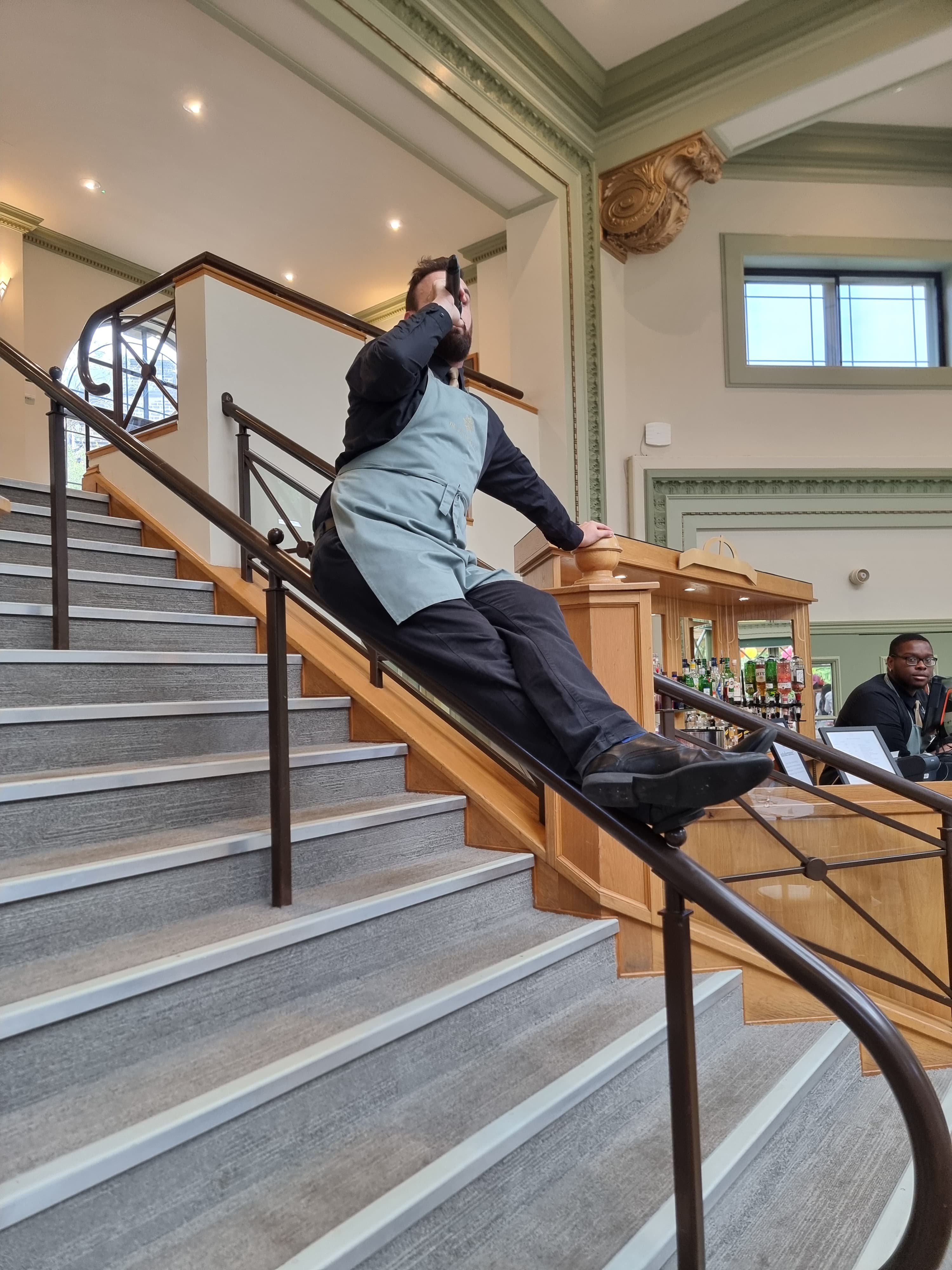 iain-sliding-down-the-stairs.jpg