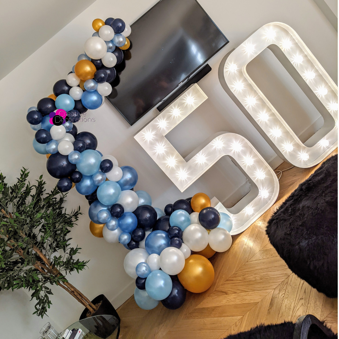 blue-gold-50th-half-arch.png