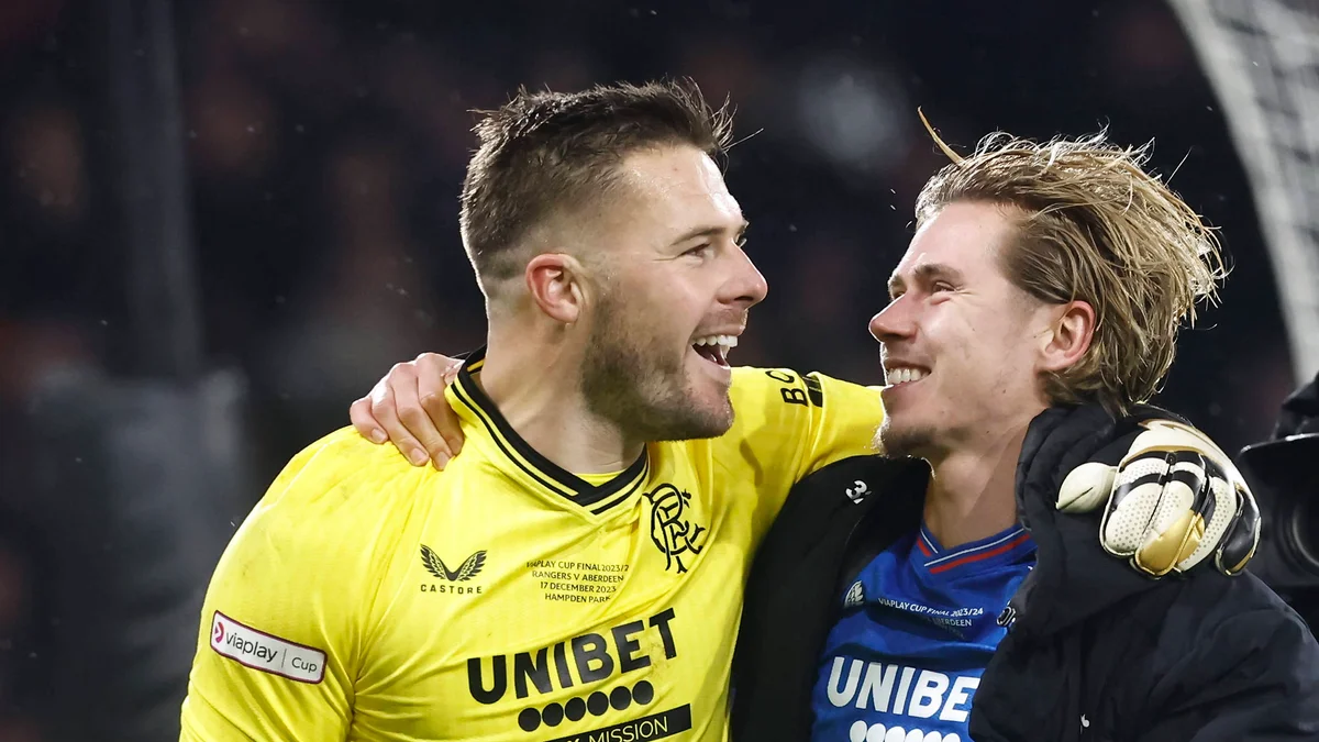 Rangers players Jack Butland (left) and Todd Cantwell (right) celebrate winning the Viaplay Cup.