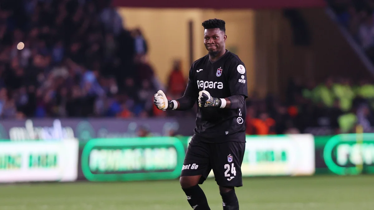 Andre Onana, Trabzonspor goalkeeper, celebrates scoring a goal against Galatasaray in the Turkish Super Lig.