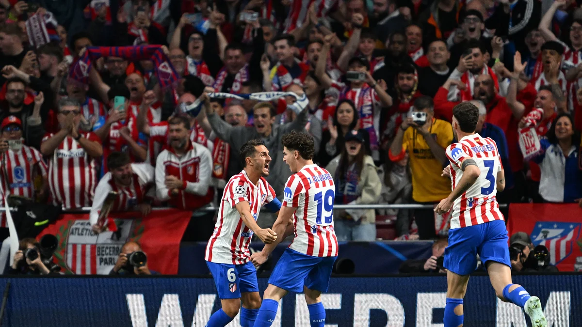 Julian Alvarez celebrates a goal with Atletico Madrid teammates against Arsenal in a Champions League semifinal.