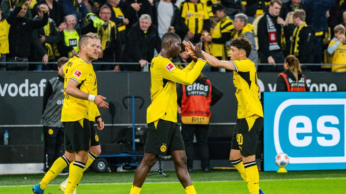 Dortmund Clinches Second Place with Dramatic 3-2 Win over Frankfurt