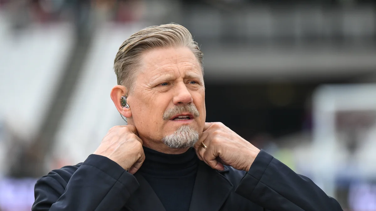 Peter Schmeichel, former Manchester United goalkeeper, watches a Premier League match between West Ham and Arsenal.