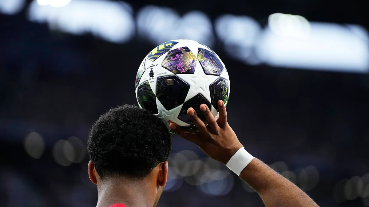 Jurrien Timber, Arsenal and Netherlands right-back, throws the ball in during the UEFA Champions League Final.