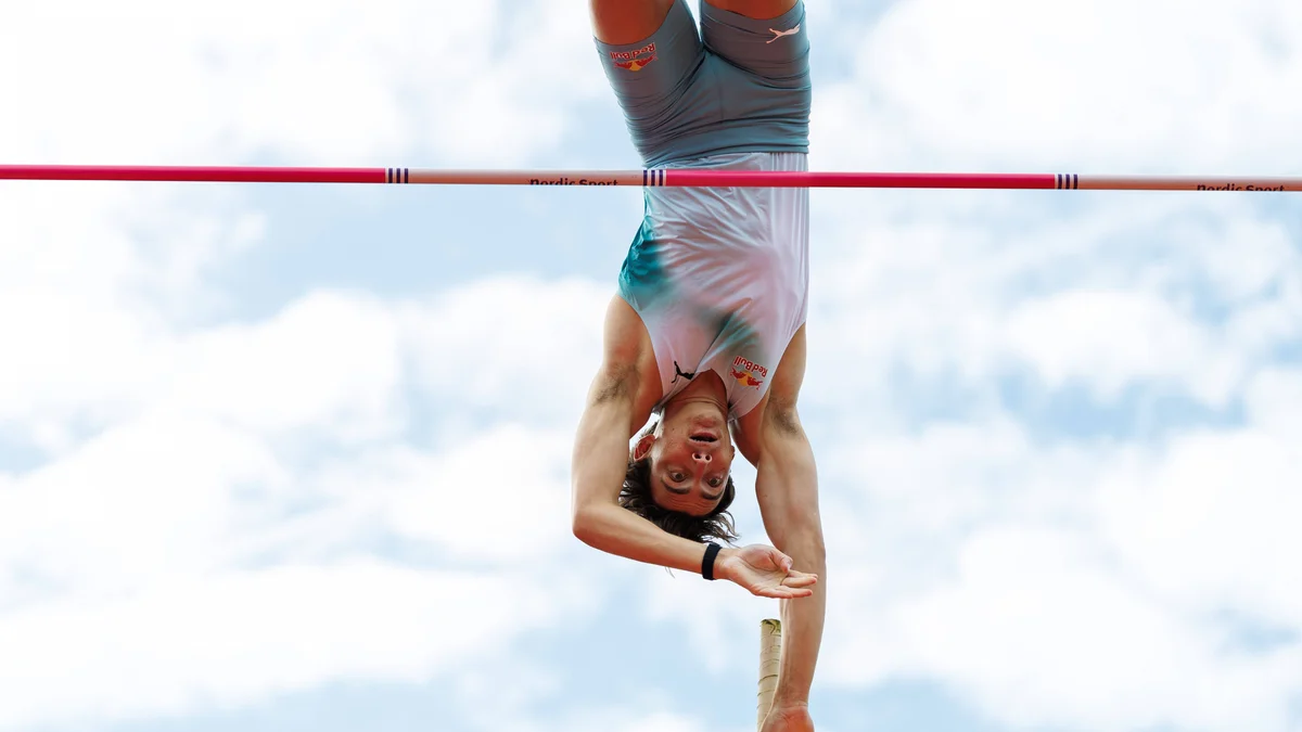 Armand Duplantis mid-air during a pole vault attempt at the Bauhaus-galan Diamond League in Stockholm.