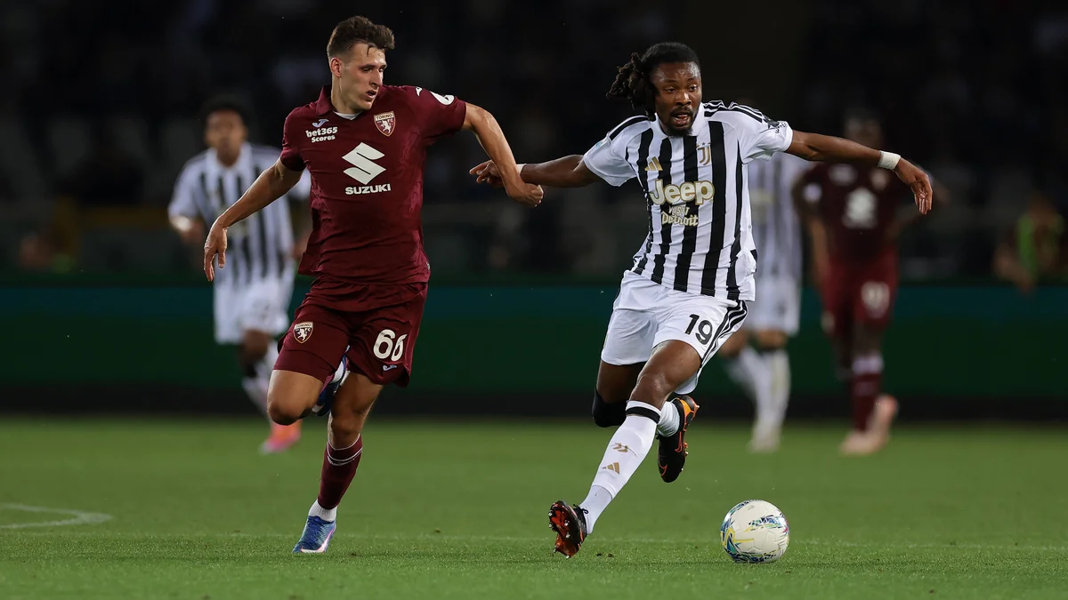 Gvidas Gineitis of Torino FC in a midfield tussle with Khephren Thuram of Juventus during a Serie A match.