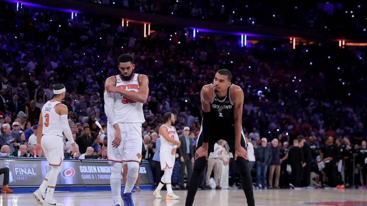 Victor Wembanyama reacts on court, facing Karl-Anthony Towns during the 2026 NBA Finals.