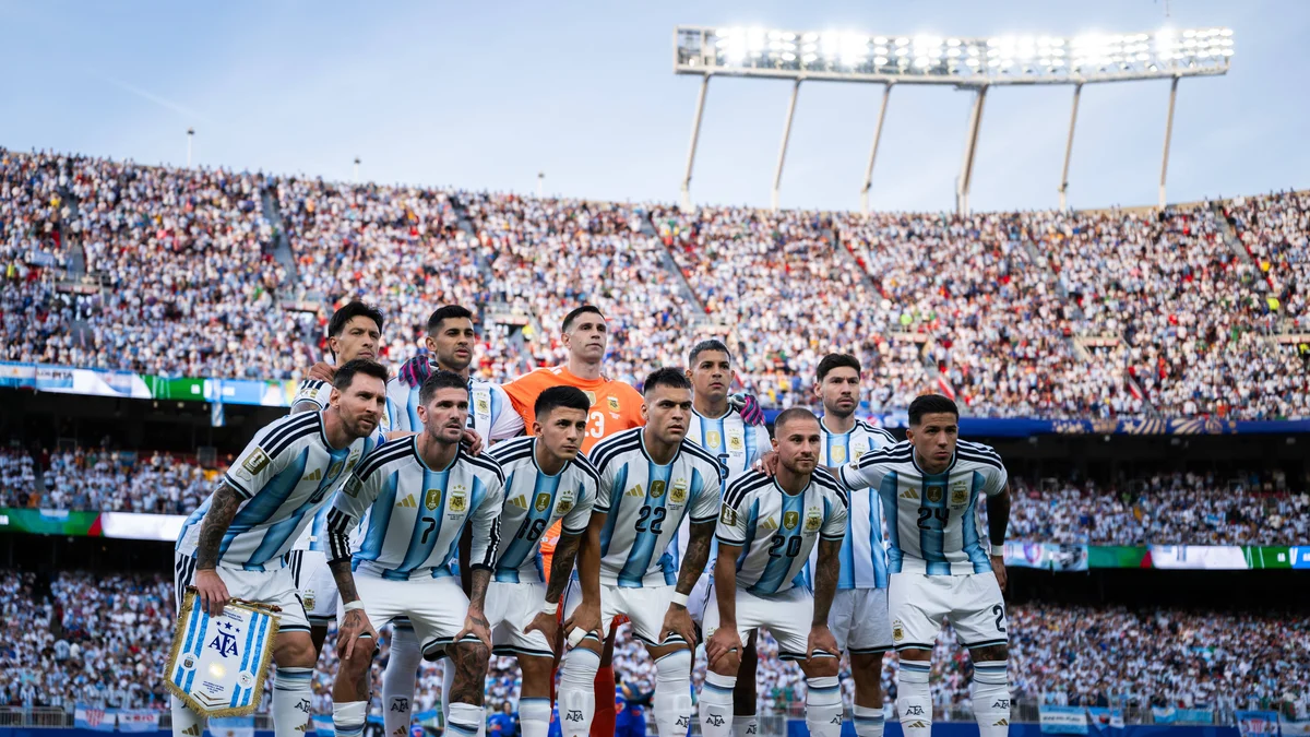 Argentina's football team, including Lionel Messi, stands together before a World Cup match.