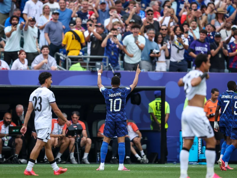 Mbappe Nears Messi's World Cup Record as France Overcomes Delay to Beat Iraq