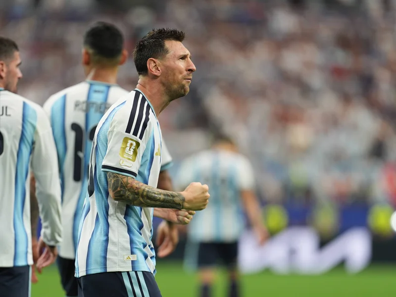 Messi Breaks World Cup Scoring Record as Argentina Tops Group J