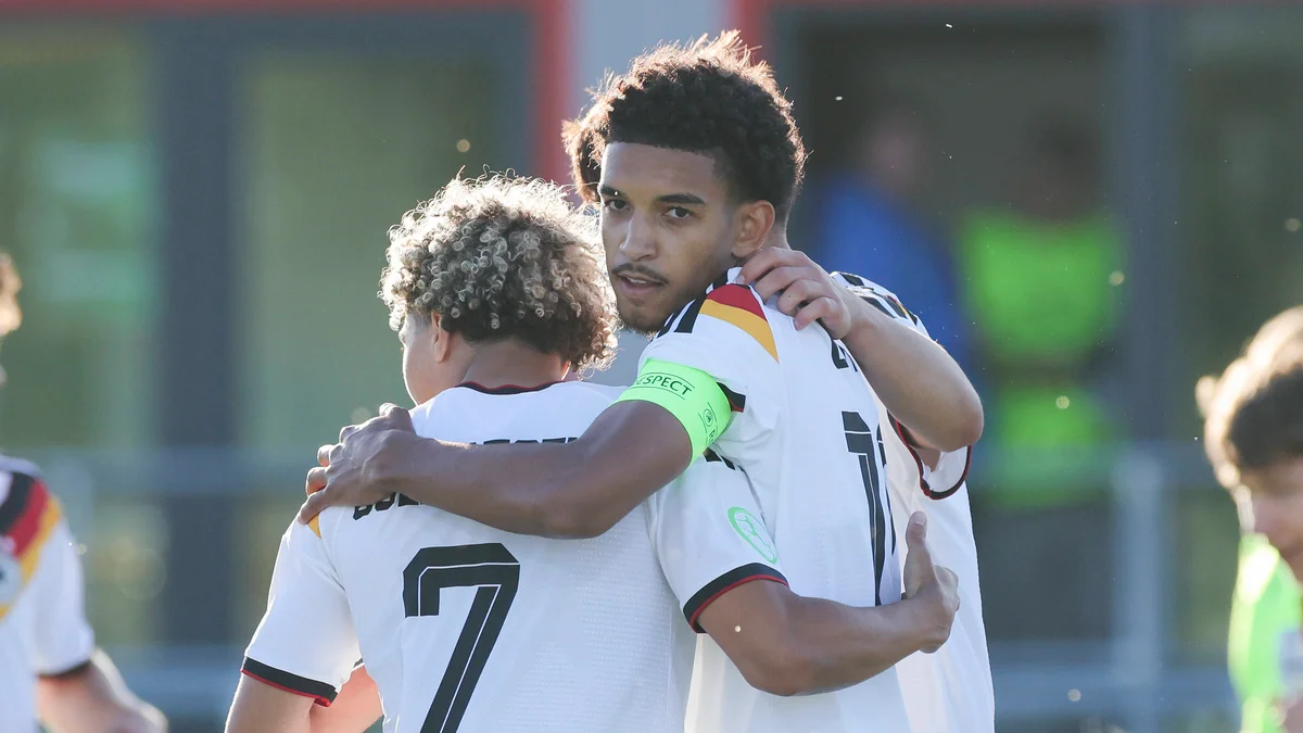 Germany's Francis Onyeka celebrates his goal with teammate Montrell Culbreath during the U19 EURO match.