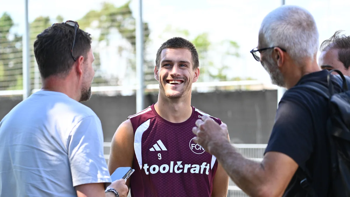 Sigurd Haugen, wearing number 9 for 1. FC Nürnberg, gives an interview during training.