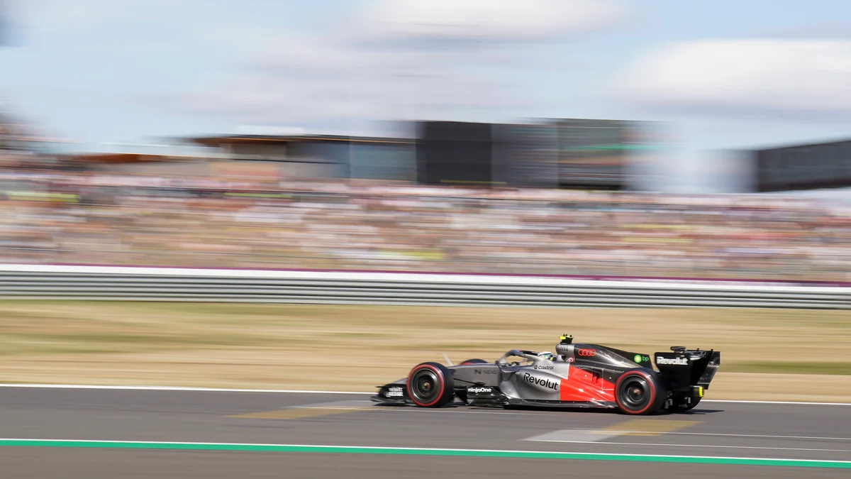 Gabriel Bortoleto in his Audi F1 car speeds around the Silverstone Circuit during qualifying.