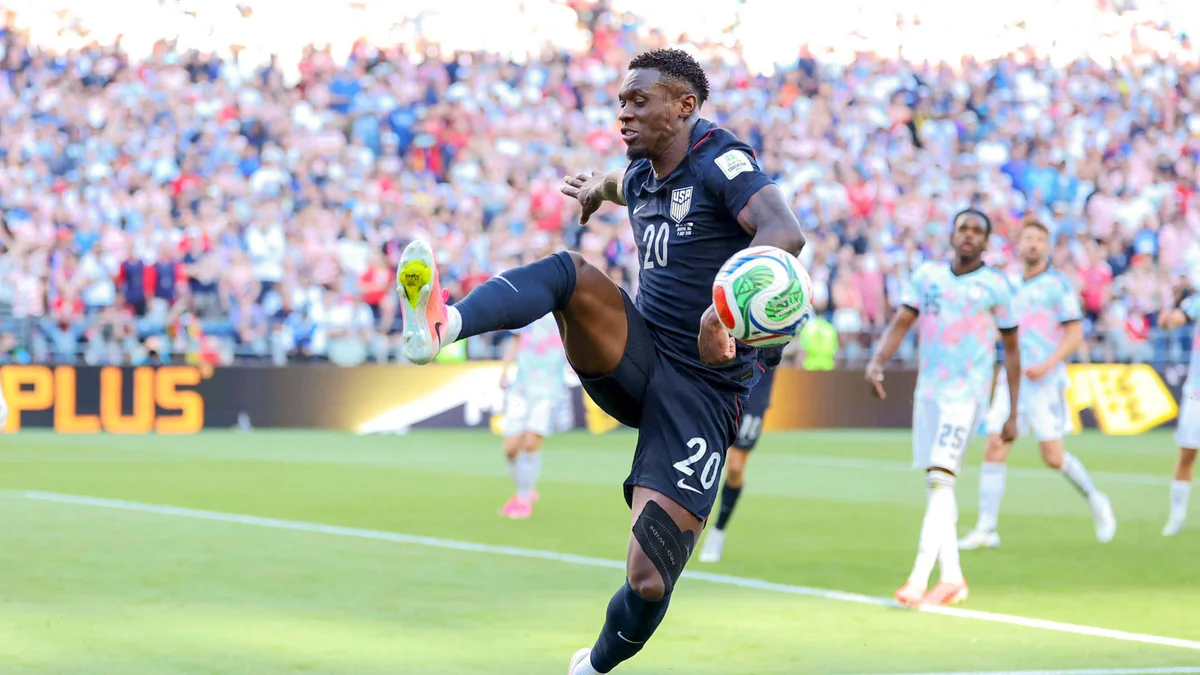 US forward Folarin Balogun kicks the ball during a FIFA World Cup round of 16 match against Belgium.