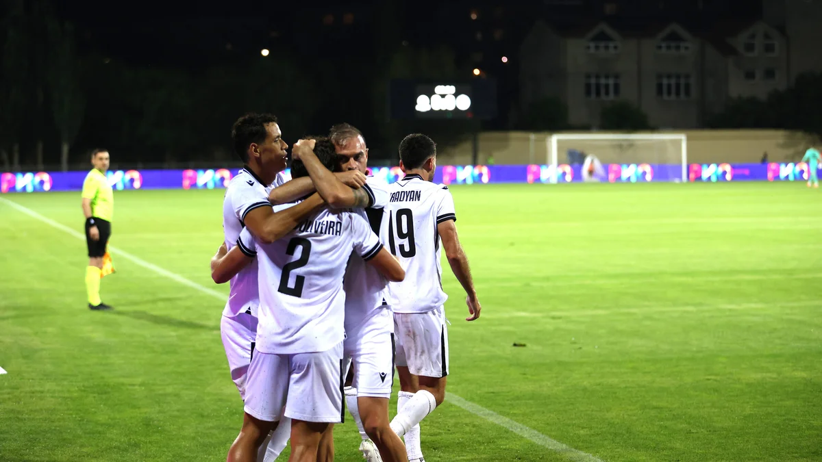 Ararat-Armenia and Riga FC players battle for the ball during their UEFA Champions League qualifying match.