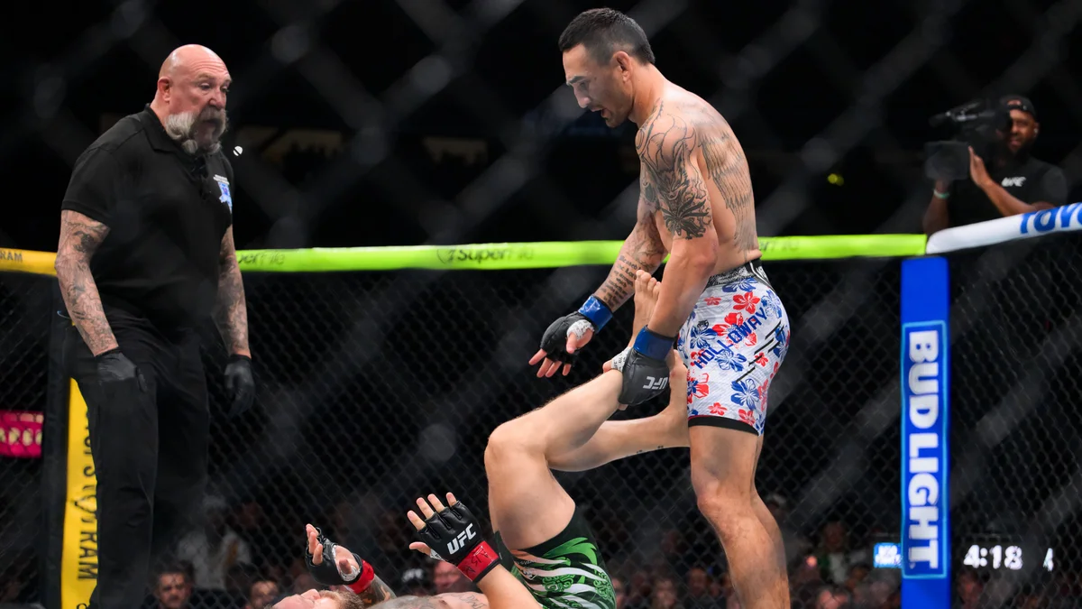 Max Holloway celebrates his TKO victory over Conor McGregor at UFC 329 in Las Vegas.