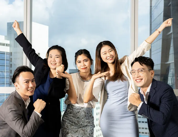 ATO Partners consultants celebrating together in their HarbourFront office