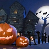 Spooky jack-o'-lantern and haunted house scene