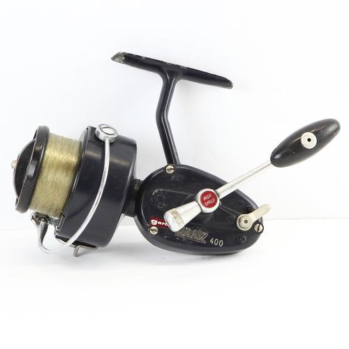 A GOOD LIGHTLY FISHED VINTAGE GARCIA MITCHELL 307 SPINNING REEL