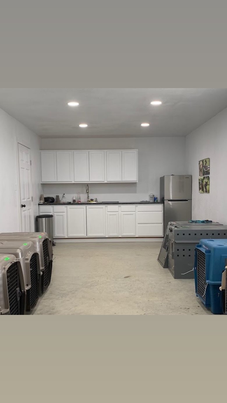 The climate-controlled indoor crate room at ATX K9