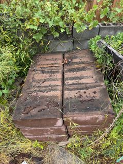 Stack of Large Brown Concrete Slabs - Image 3