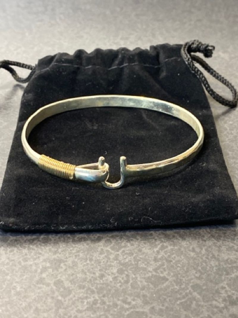 Island Hook Bracelet Hammered sterling silver with gold detail from
