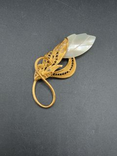 Gold Tone Filigree Foliage Brooch With Carved Mother of Pearl Leaf - Image 1