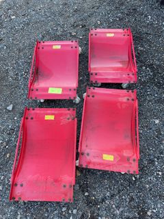 Four Red Steel Vehicle Dollies - Image 1
