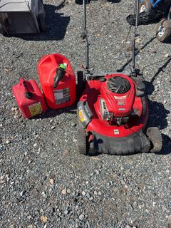 Walk-Behind Lawn Mower with Gas Cans - Image 1