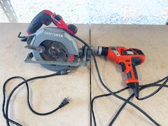 Corded Craftsman Circular Saw and Black and Decker Drill - Image 1