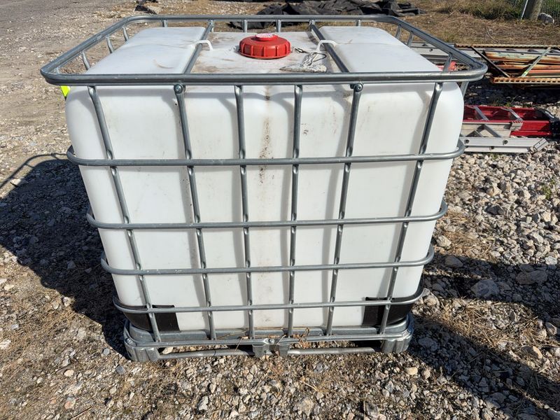 275 Gallon Plastic IBC Tote with Valve - Image 1