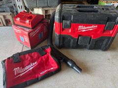 Milwaukee Pack Out Vac with Charger  - Image 1
