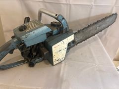 Homelite XL-12 Gas-Powered Chainsaw with Guide Bar - Image 1