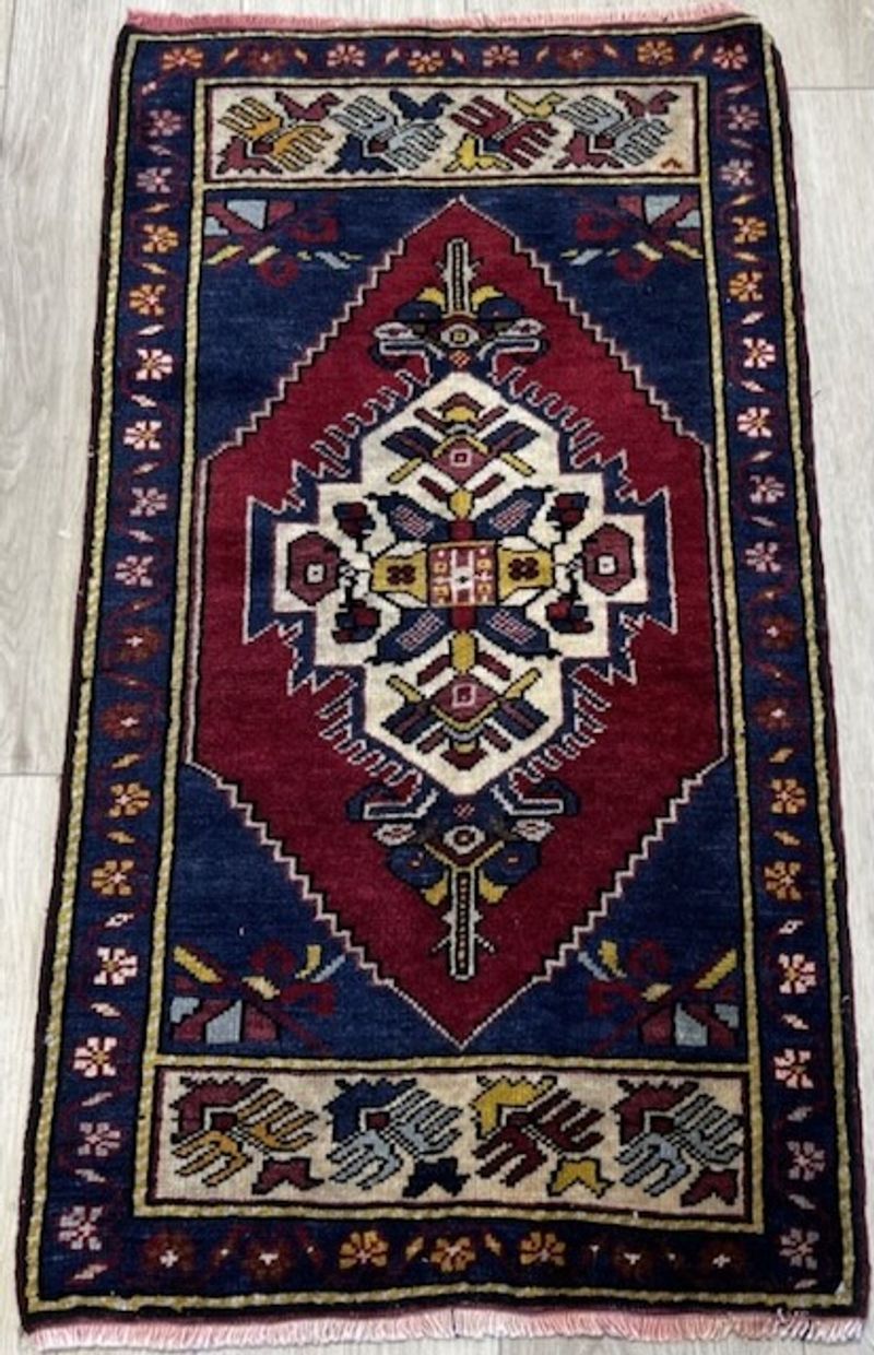 Quality Wool Hand Knotted Rug Auction. Alexandria VA banner
