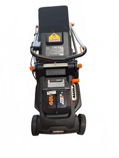 WORX 40V Cordless Lawn Mower, Bent Front Wheel - Image 1