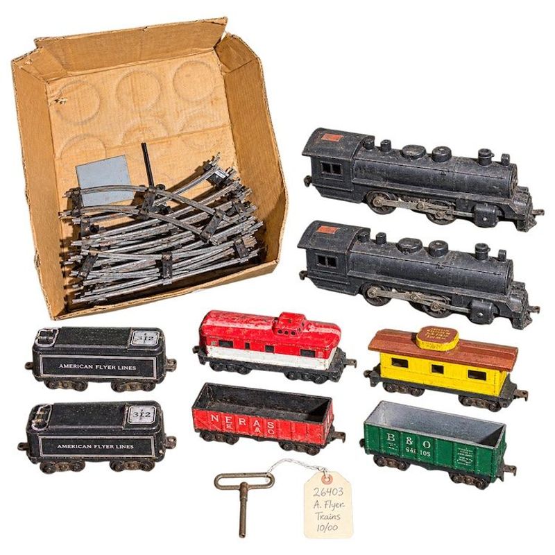 Train Cars Including (2) Engines, Some Train Track, And Marx Train Set Key