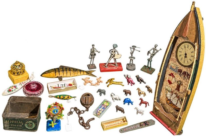Fishing Reels, Lures, Metal Figurines, Knives, Boat Clock, Antique Lock, And More