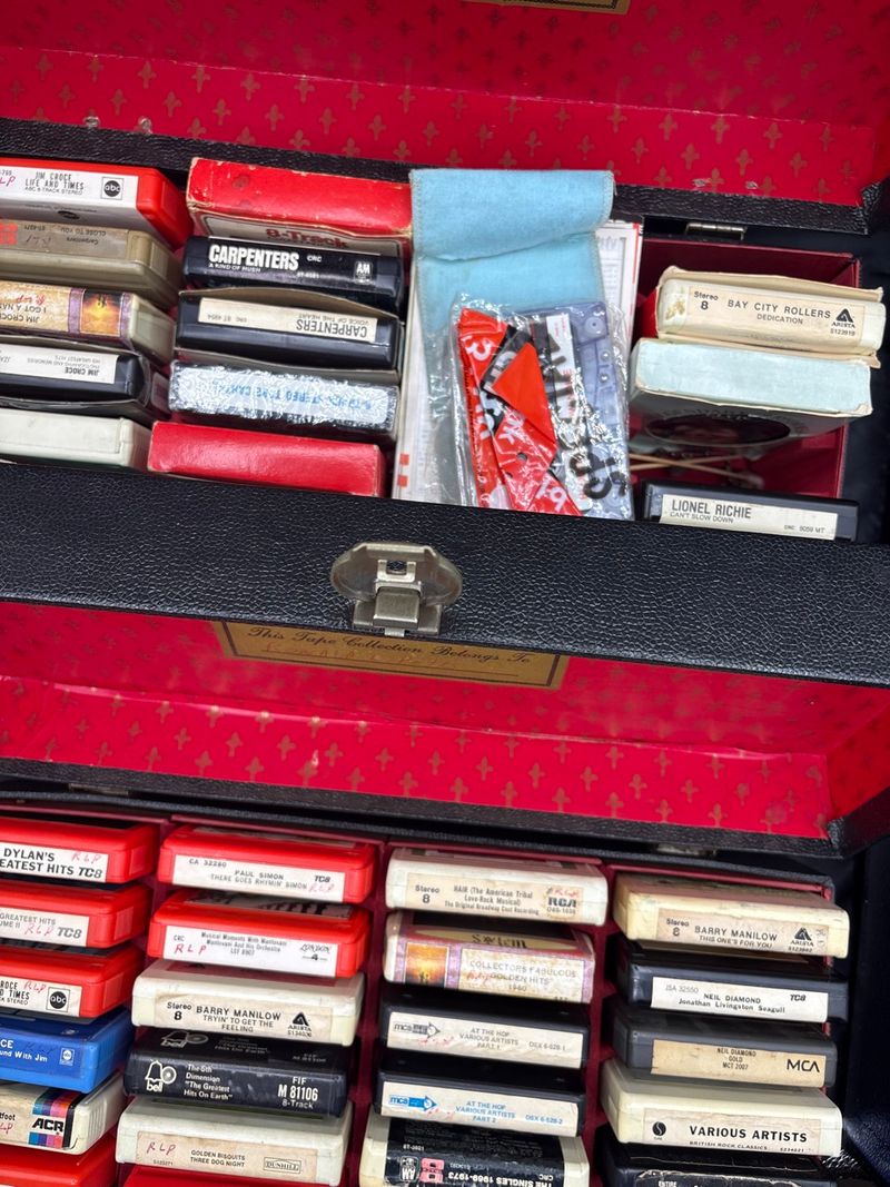 Collection of Classic 8-Track Cartridges in Carrying Case