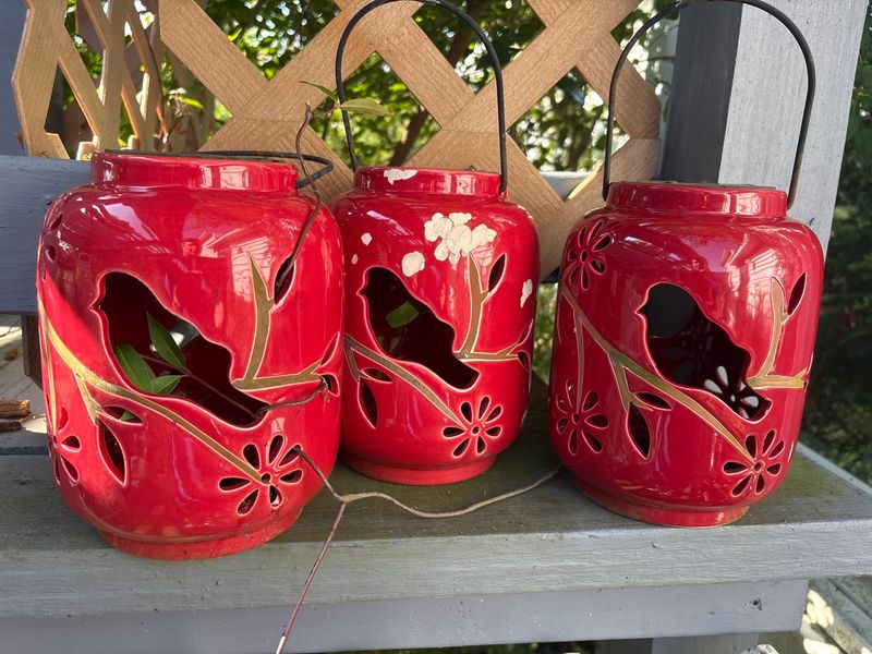 Set of Three Red Glazed Ceramic Hanging Lanterns With Bird Cutouts