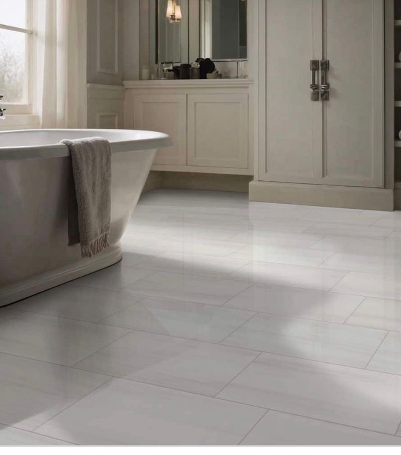 MSI  Marble Look Porcelain Tile 12 in. 24 in.,Bianco Dolomite Polished White Floor and Wall (16 sq. ft. /Case)