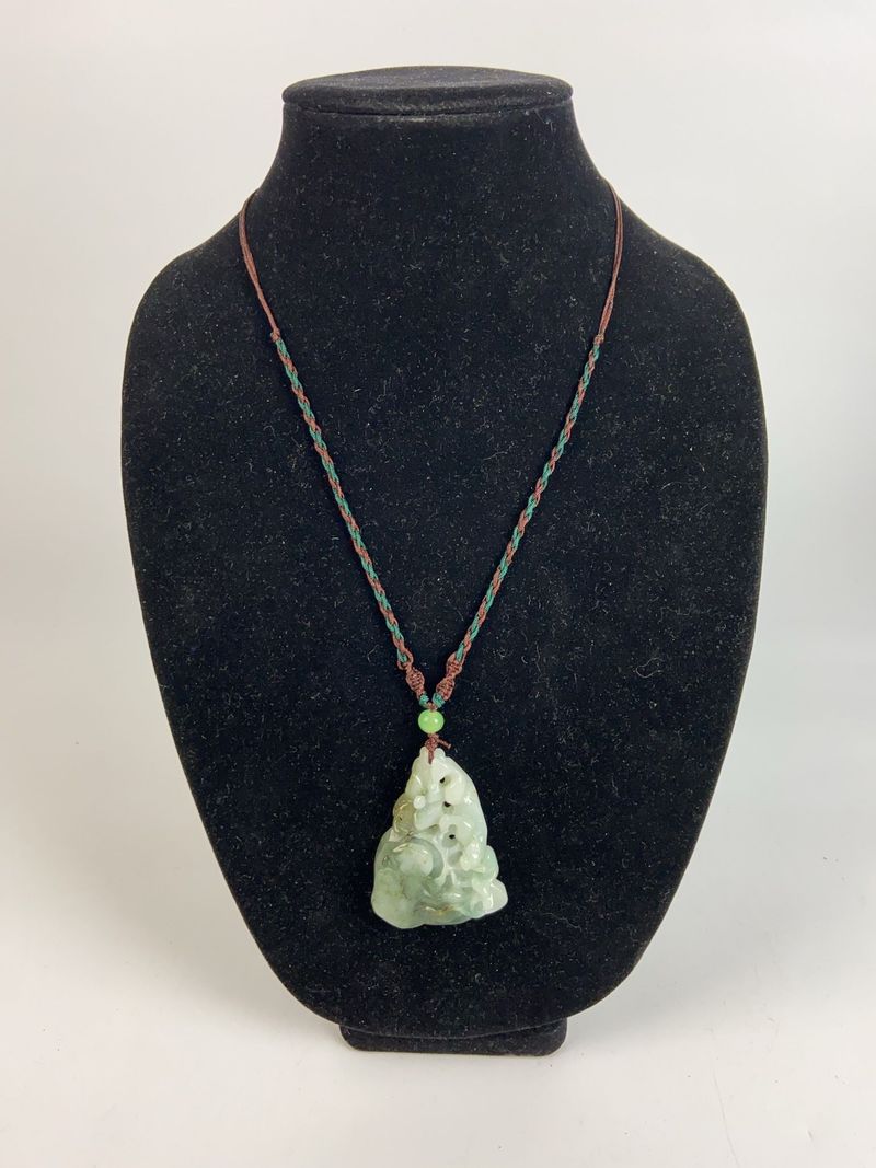Carved Jade Pendant Necklace on Braided Cord - Image 1